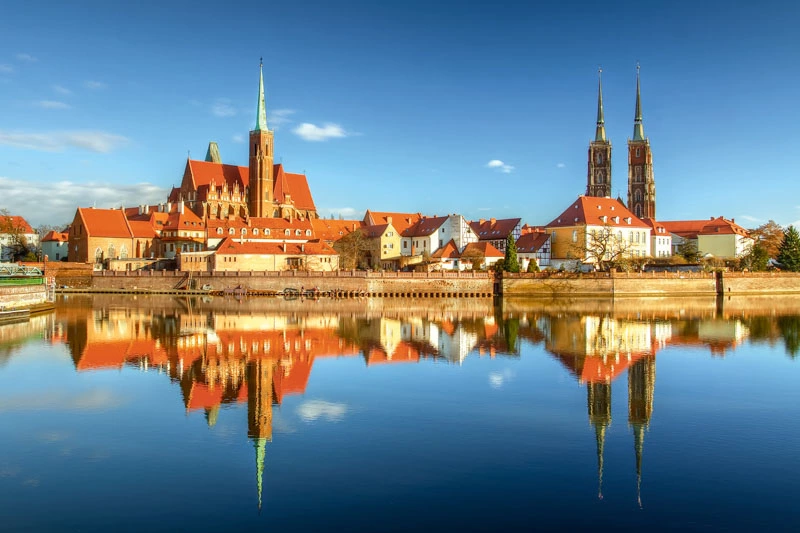 Cloud - Sky, Cultures, Famous Place, Gothic Style, Panoramic, Travel Destinations, Urban Scene, Visit, Wroclaw, architecture, beautiful, blue, cathedral, church, city, cityscape, europe, history, island, landscape, old, poland, reflection, river, sky, tower, travel, water