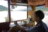 Fahrt auf unserem Langboot über den Mekong