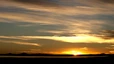 Blick auf den südlichen Teil des Salar de Uyuni bei Sonnenuntergang